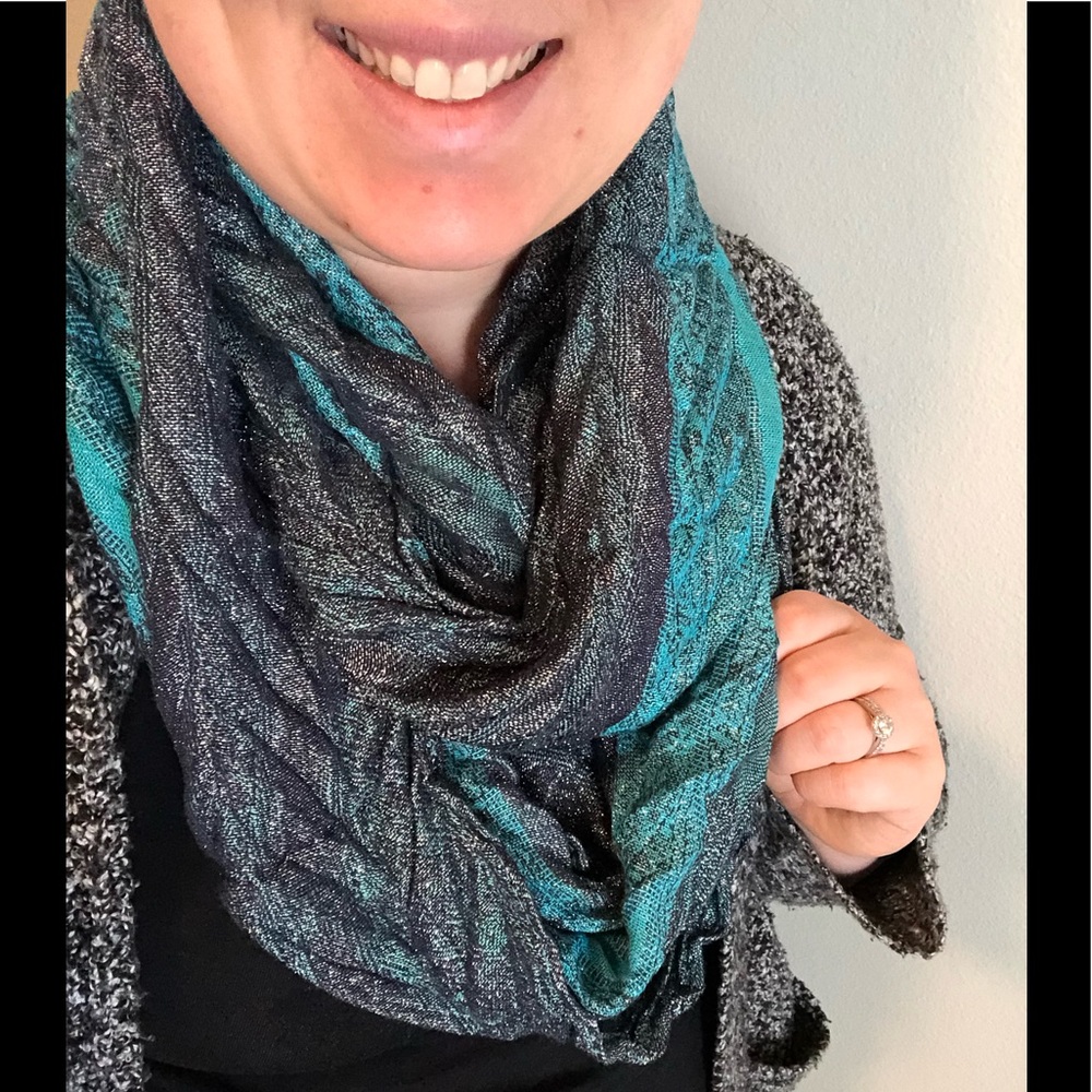 Shimmery infinity scarf with peacock colors